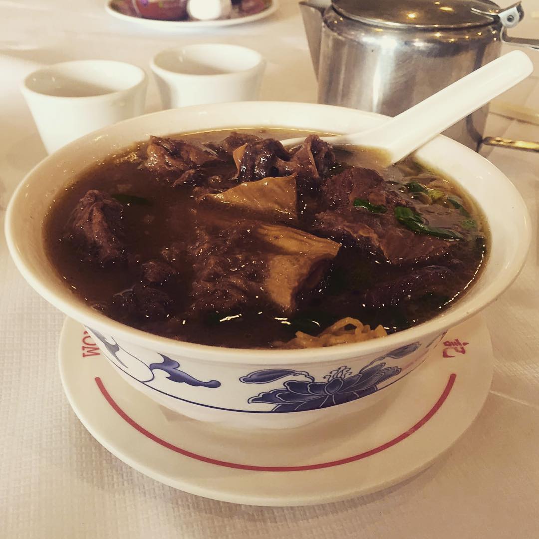 A yummy bowl of beef broth served at Wong Kei, one of the best Chinese restaurants in London