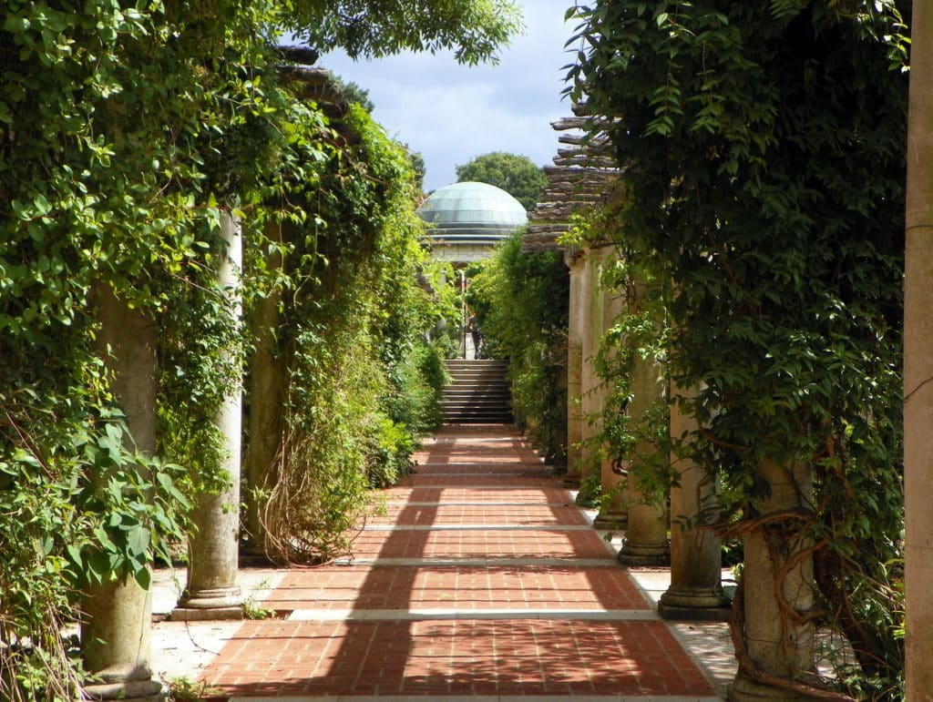 the greenery lined path of the hampstead hill gardens and pergola