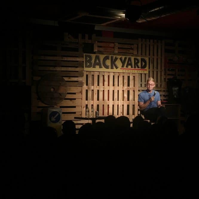 Russell Howard performing at the Backyard Comedy Club, one of the best comedy clubs in London