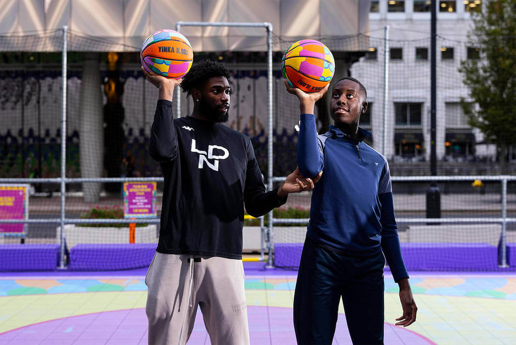 Two of the London Lions coaching a session in Canary Wharf