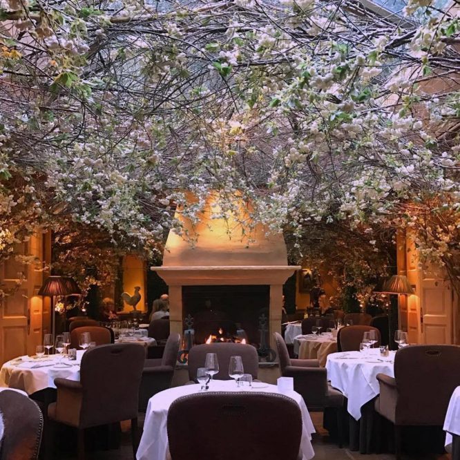 The beautiful interior of Clos Maggiore, one of the most romantic restaurants in London and one of the best date ideas in London 