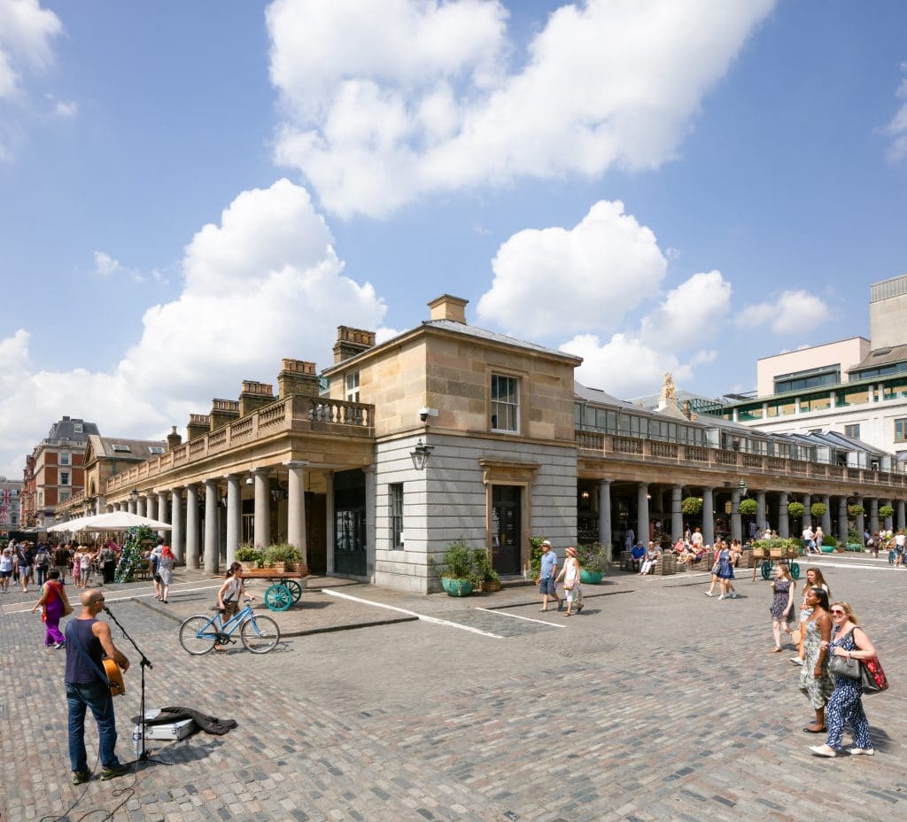 The sunny plaza of Covent Garden in Central London