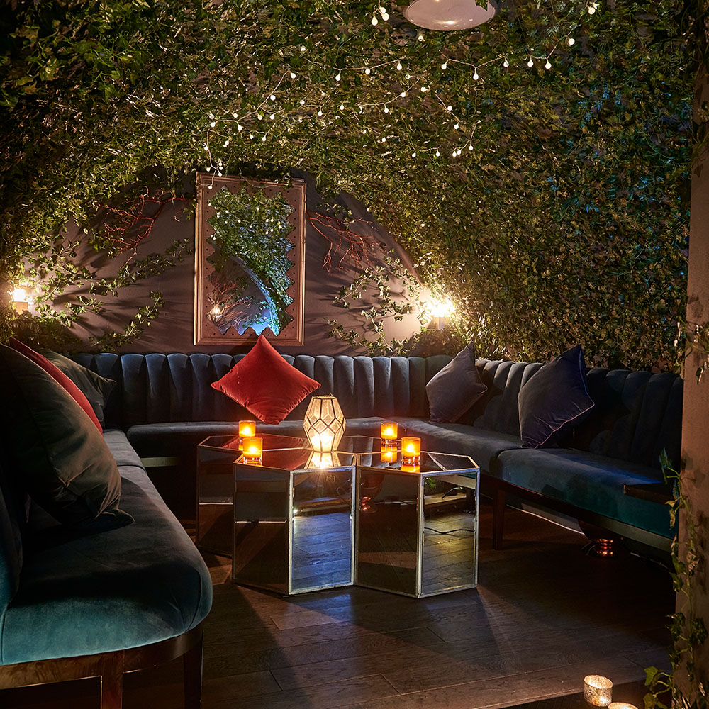 The foliage-filled interior of Eve Bar in Covent Garden, Central London