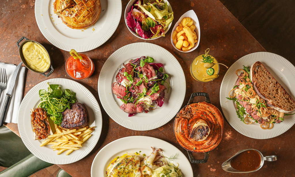 a selection of dishes from hawksmoor arrayed on a table