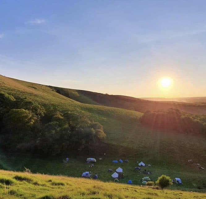 An incredible sunset over the campground of Woodfire Camping at Firle in East Sussex