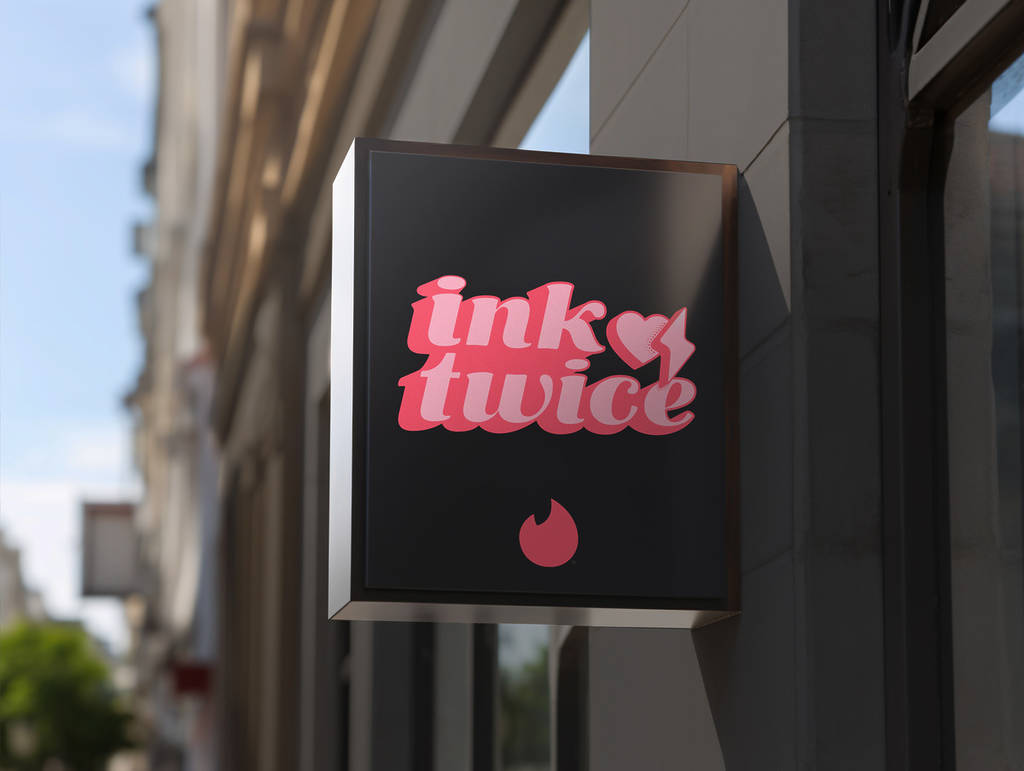a sign reading 'ink twice'