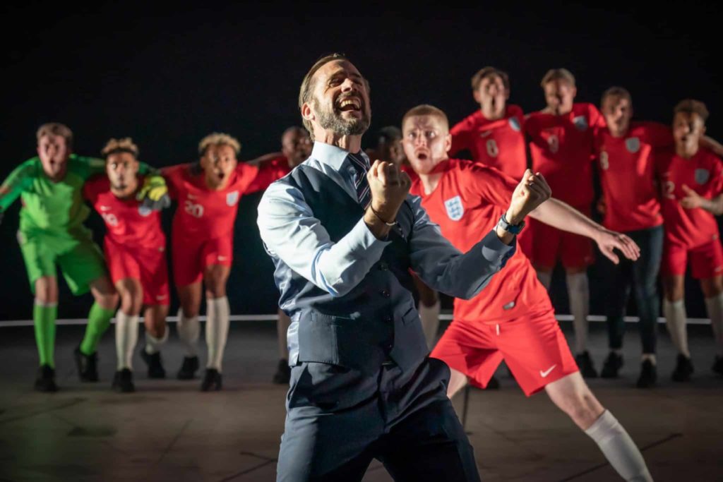 Joseph Fiennes as Gareth Southgate onstage with the rest of the cast of London theatre show Dear England 
