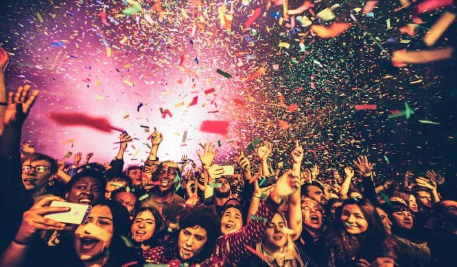 People loving the music surrounded by confetti at the Kaleidoscope Festival in London
