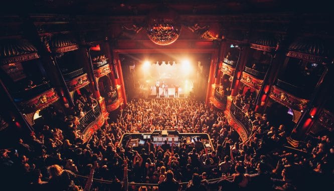 Someone playing a gig in the legendary music venue KOKO in Camden, London