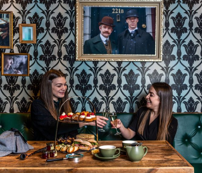 Two girls enjoying a spot of afternoon tea at The Sherlock Experience in Central London