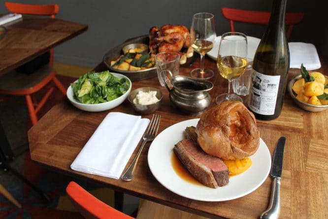 A delicious roast dinner served with wine at the Marksman on Hackney Road