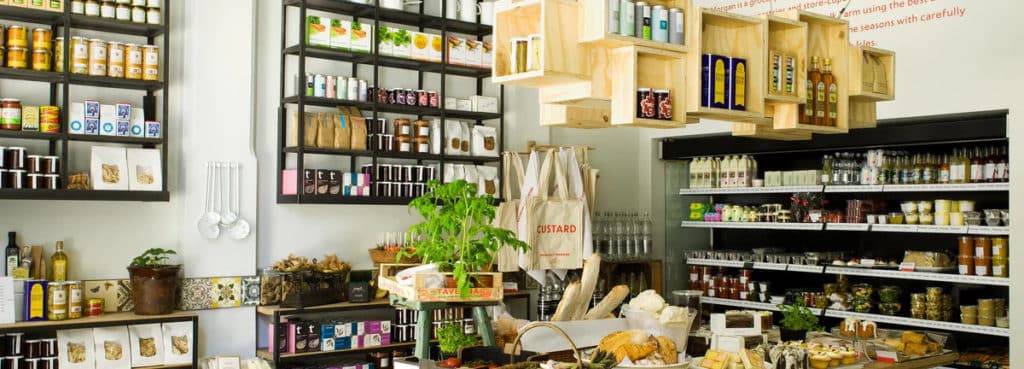 the interior of the Melrose and Morgan deli showing shelves absolutely full of products