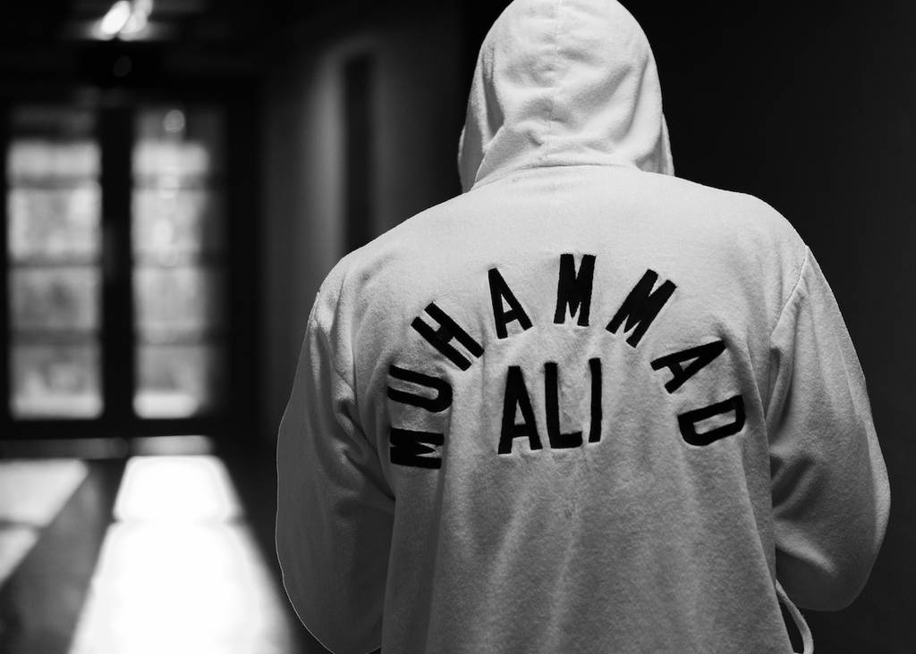 the back a man wearing a hoodie saying Muhammad Ali