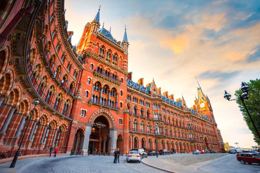 The magnificent St. Pancras hotel in Central London bathed in orange light