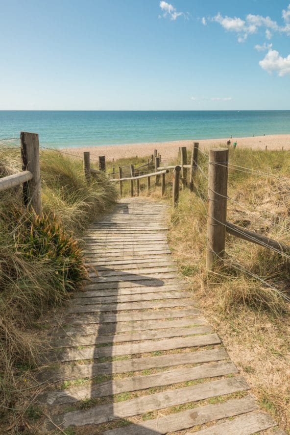 Stairs down to the beach in West Sussex, one of the beaches near London in this roundup