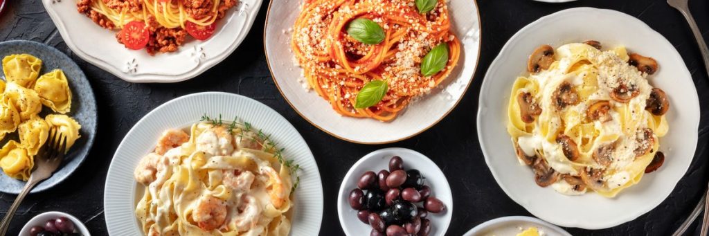 A selection of delicious Italian fare including pasta and pizza on this roundup of the best Italian restaurants in London