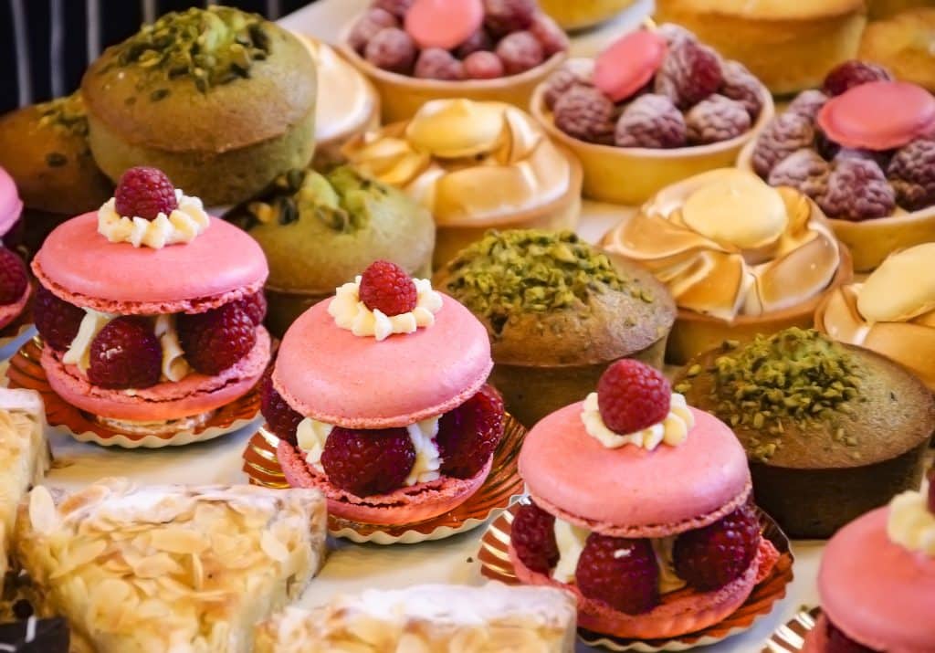 A colourful selection of delicious cakes, macaroons and pastries served at a cake shop in London