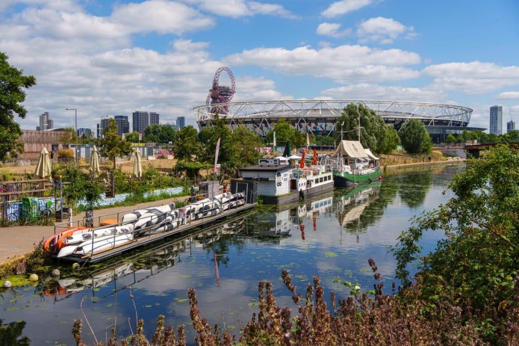 Barge East, the canal and the ArcelorMittal Orbit in Hackney Wick
