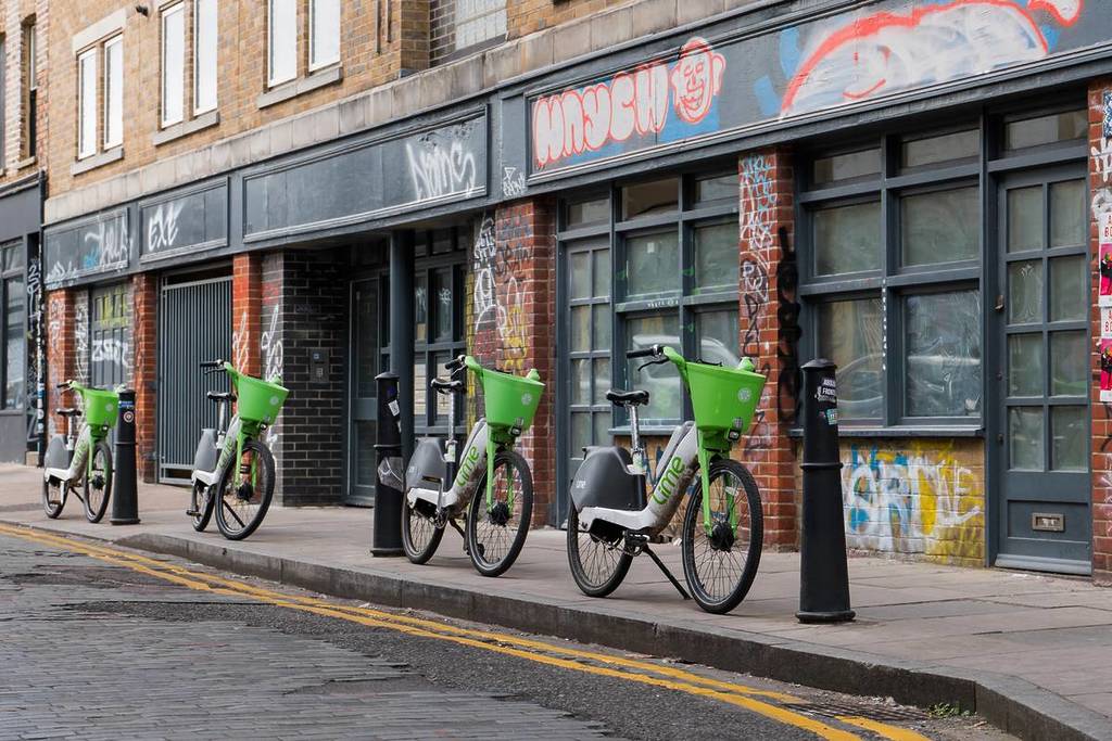 Lime bikes parked on the pavements in London