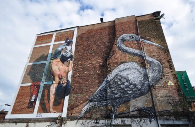 Graffiti of the famous crane by ROA in Brick Lane, London