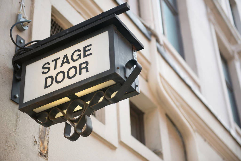 a stage door sign outside one of London's theatre shows