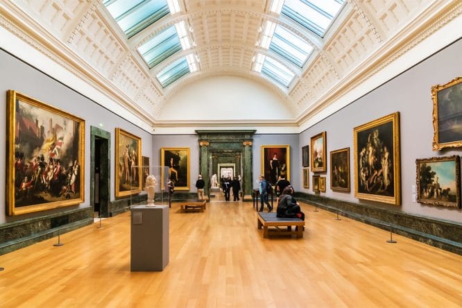 Paintings in the cavernous hall of the Tate Britain in Pimlico, London