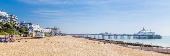 The long beach and pier in Eastbourne, one of the beaches near London in this roundup