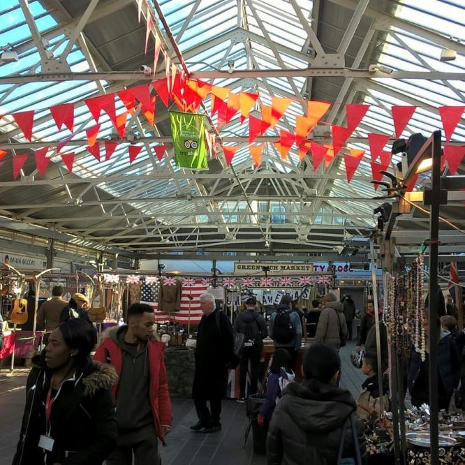 People wandering through Greenwich Market, one of the best weekend markets in London 