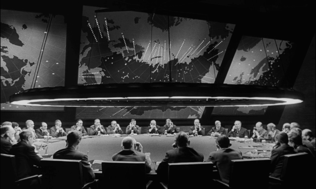 a movie still of The War Room with the Big Board from Stanley Kubrick's 1964 film, Dr. Strangelove.